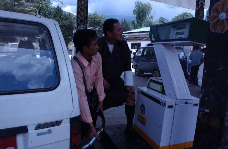 TAXI DRIVER BHUTAN PETROL STATION HIGH OIL PRICE