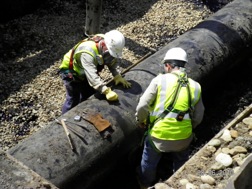 Oil workers together